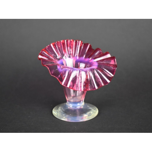 425 - A Small Late Victorian Cranberry Glass Jack in the Pulpit Vase, 8.5cms High