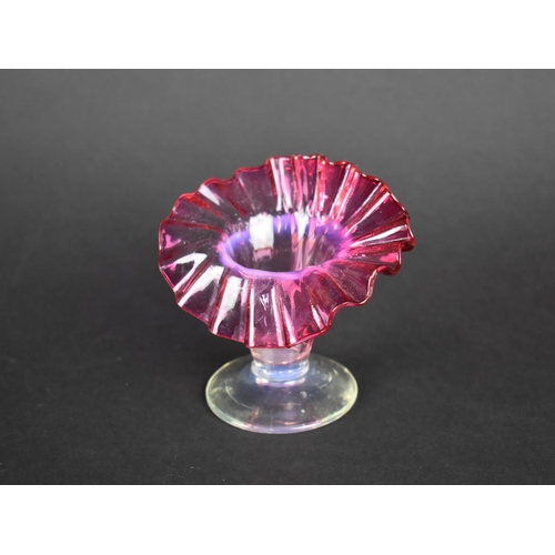 425 - A Small Late Victorian Cranberry Glass Jack in the Pulpit Vase, 8.5cms High