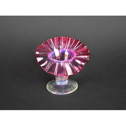 425 - A Small Late Victorian Cranberry Glass Jack in the Pulpit Vase, 8.5cms High