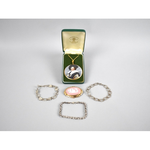 466 - A Boxed Crown Staffordshire Pendant, The Laughing Cavalier together with a Wedgwood Jasperware Brooc... 