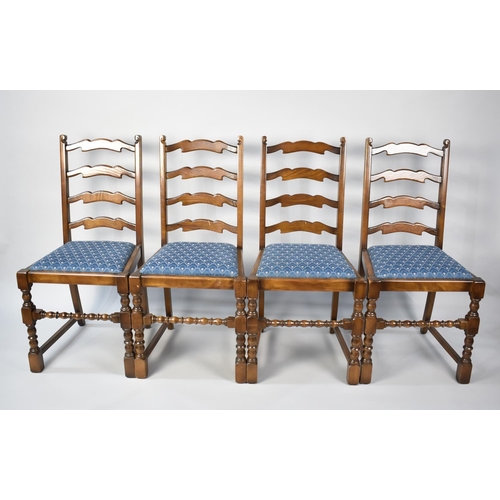 507 - A Set of Four Oak Framed Dining Chairs