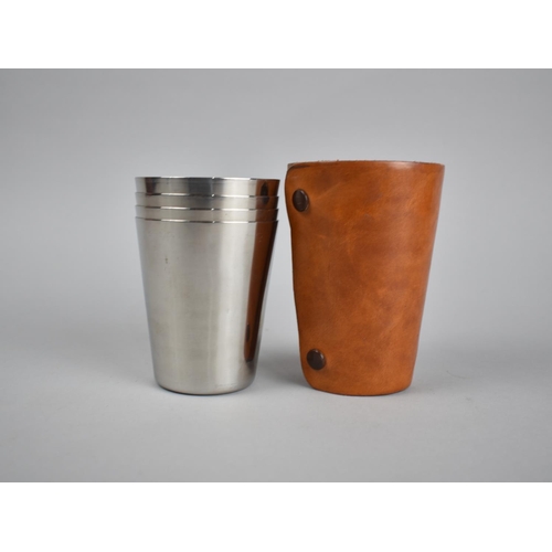 75 - A Mid 20th Century Leather Cased Set of Four Stainless Steel Stacking Cups