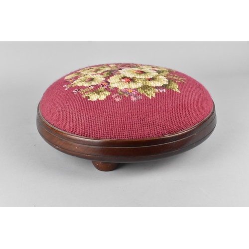 83 - An Edwardian Circular Tapestry Topped Footstool, 31cms Diameter