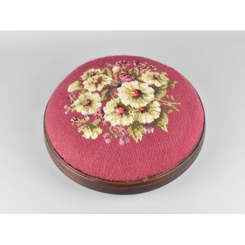 83 - An Edwardian Circular Tapestry Topped Footstool, 31cms Diameter