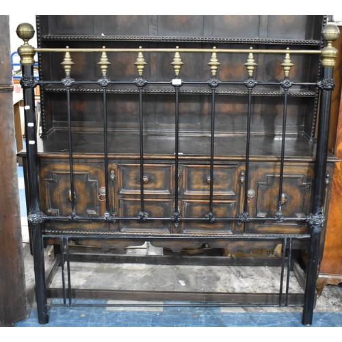 521 - A Victorian Brass and Iron Double Bed End