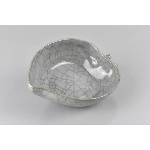 236 - A Chinese Celadon Crackle Glazed Brush Washer in the Form of a Leaf, 15cm x 3.5cm high