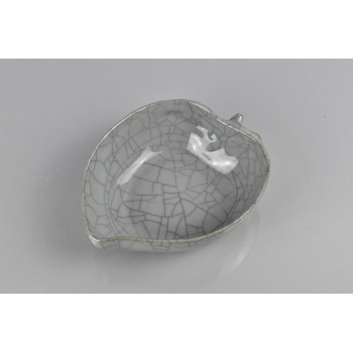 236 - A Chinese Celadon Crackle Glazed Brush Washer in the Form of a Leaf, 15cm x 3.5cm high