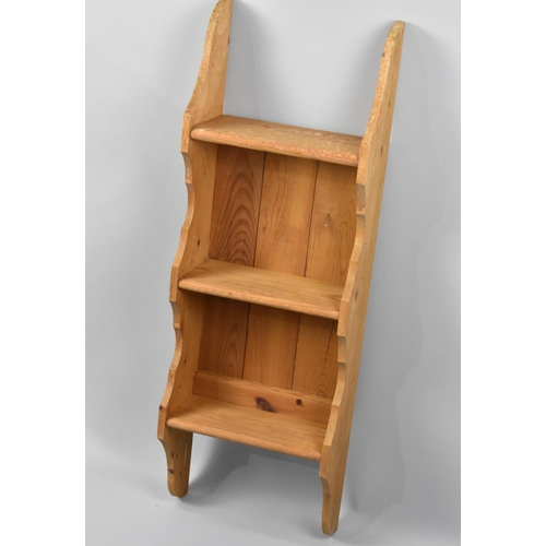 102 - A Modern Pine Narrow Wall Hanging Three Shelf Unit, 30cms Wide