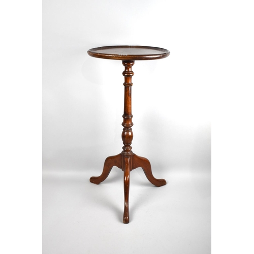 108 - A Mid 20th Century Mahogany Wine Table with Circular Top and Tripod Base, 30cms Diameter and 62cms H... 