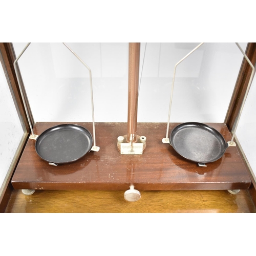 124 - A Vintage Scientific Pan Scale in Glazed Mahogany Case, Complete with a Set of Baird and Tatlock Wei... 