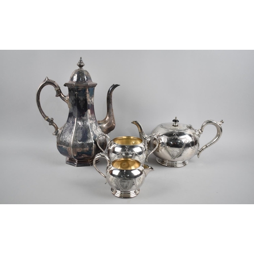 168 - A Silver Plated Britannia Metal Three Piece Tea Service together with a Coffee Pot by James Dixon