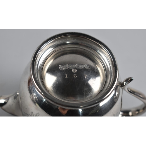 168 - A Silver Plated Britannia Metal Three Piece Tea Service together with a Coffee Pot by James Dixon