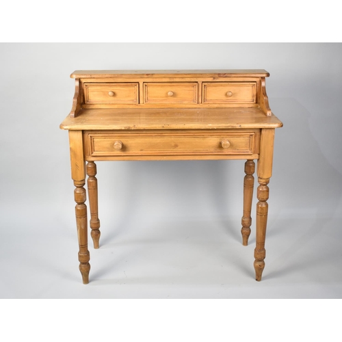 170 - A Modern Pine Writing Desk with Single Drawer and Turned Supports and Three Small Drawers to Raised ... 