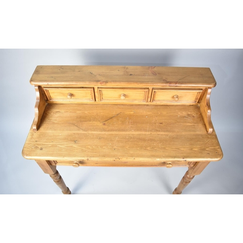 170 - A Modern Pine Writing Desk with Single Drawer and Turned Supports and Three Small Drawers to Raised ... 