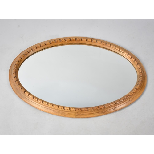 195 - A Modern Pine Framed Oval Wall Mirror, 86cms Long