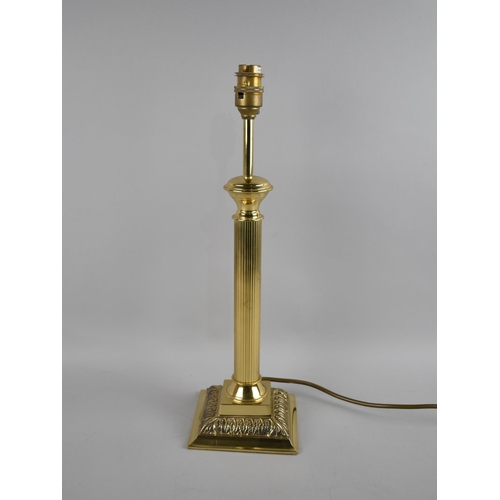 214 - A Modern Brass Table Lamp in the Form of a Reeded Column, No Shade, 44cms High