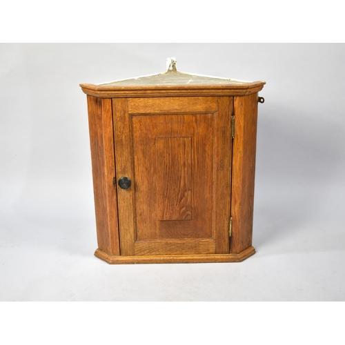 221 - A Mid 20th Century Oak Wall Hanging Small Corner Cupboard, 50cms Wide and 53cms High