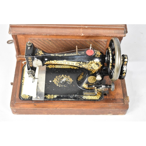 231 - A Vintage Cased Manual Singer Sewing Machine