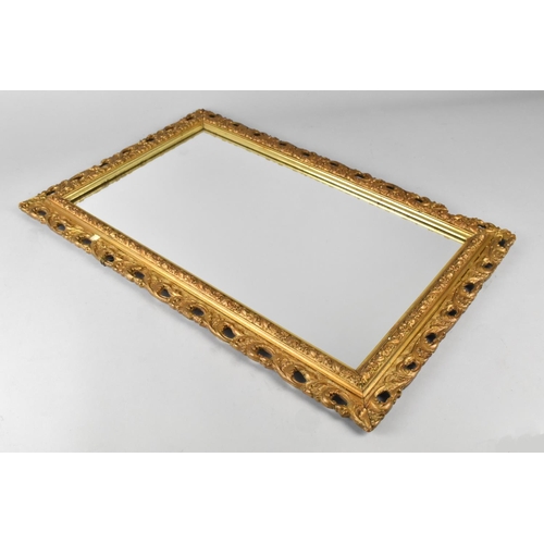 253 - An Ornate Gilt Framed Pierced Wall Mirror, 39x60cm