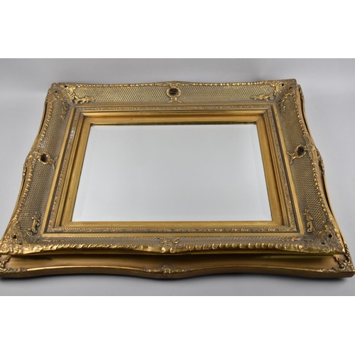 266 - An Ornate Gilt Framed Wall Mirror with Bevelled Glass, 64x54cm Overall