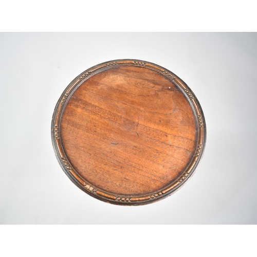 59 - A Mid 20th Century Mahogany Circular Tripod Wine Table, 28cm Diameter and 49cms High