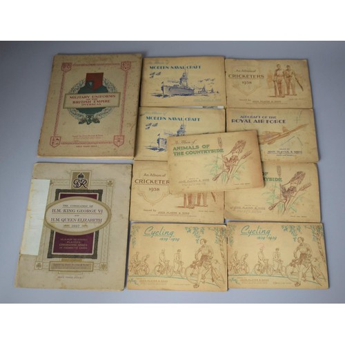 179 - A Collection of 12 Cigarette Card Albums and Contents