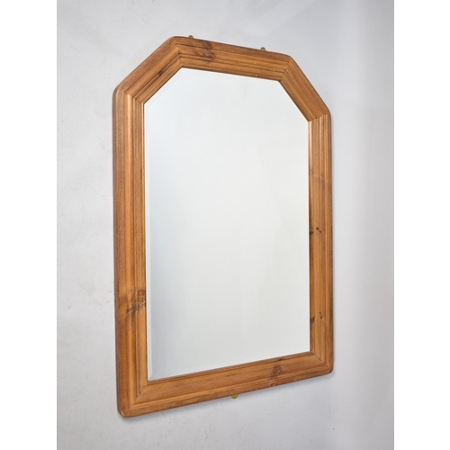 228 - A Large Modern Stained Pine Framed Wall Mirror, 77cms Wide and 110cms High