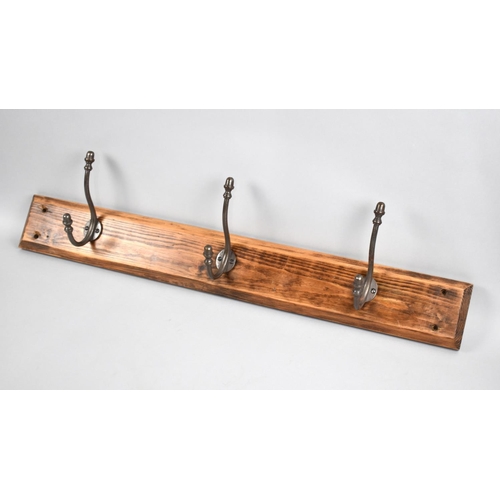 126 - A Three Hook Coat Rail, 75cms Long