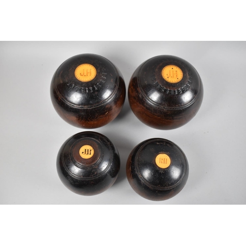 128 - A Pair of Vintage Turned Wooden Lawn Bowls and a Pair of Jacks