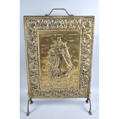 152 - A Mid 20th Century Pressed Brass Fire Screen Decorated with Galleon, 39cms Wide