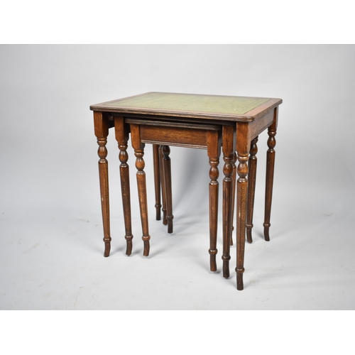 160 - A Nest of Three Tables with Tooled Leather Tops, 50cms Wide