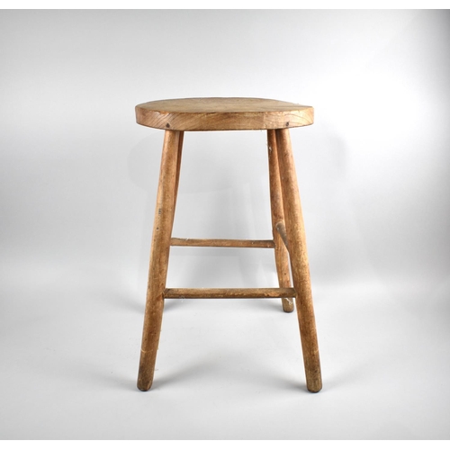 171 - A Mid 20th Century Oval Topped Stool on Turned Supports, 53cms High