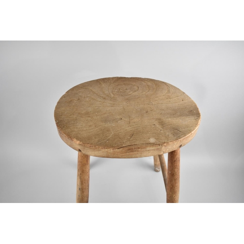 171 - A Mid 20th Century Oval Topped Stool on Turned Supports, 53cms High