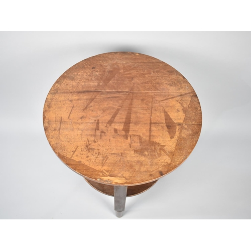 175 - A Circular Occasional Table with Stretcher Shelf, 54.5cms Diameter