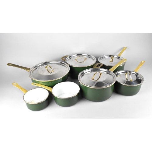 193 - A Collection of Enamelled Cooking Pans