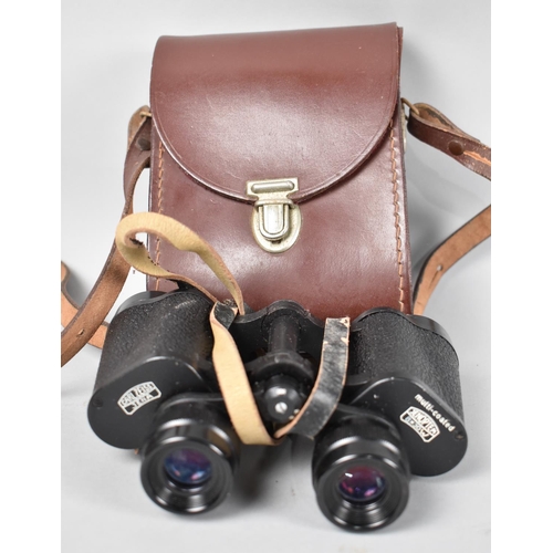 264 - A Pair of Leather Cased Carl Zeiss Jena Jenoptem 6x30 Binoculars