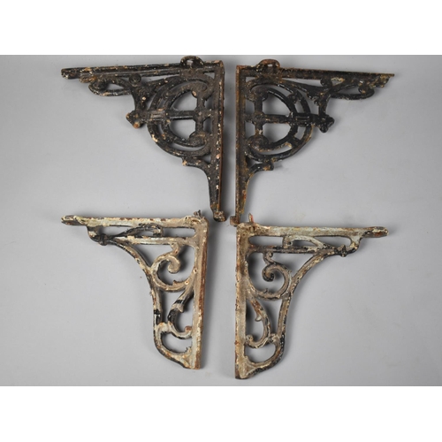 268 - Two Pairs of Painted Cast Iron Shelf Brackets, 18cms High and 24cms High