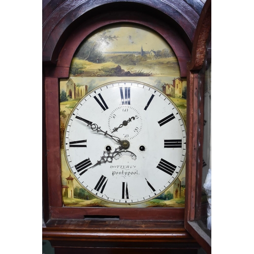 273 - A 19th Century Mahogany Long Case Clock with Painted Arched Dial inscribed for Dotter and Co, Pontyp... 