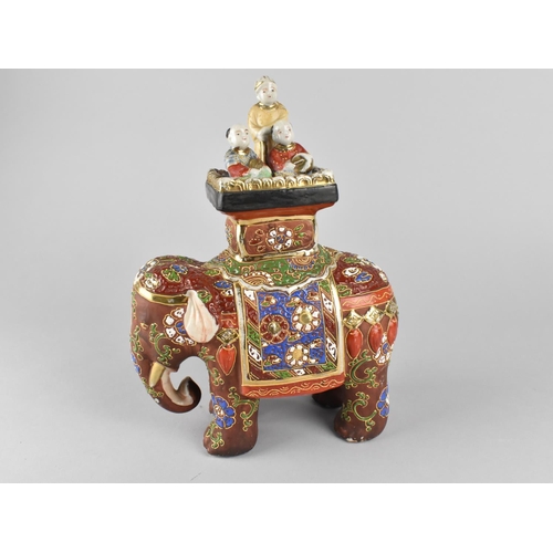 295 - A Japanese Satsuma Figure Group, Elephant and Riders, 25cm high