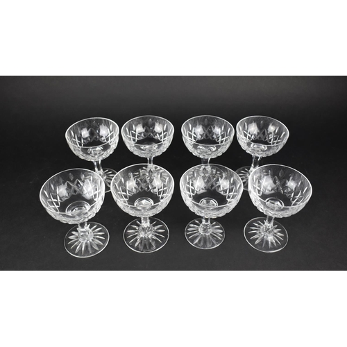 400 - A Set of Eight Nice Quality Cut Glass Coupes, 13cm high and 10cm Diameter