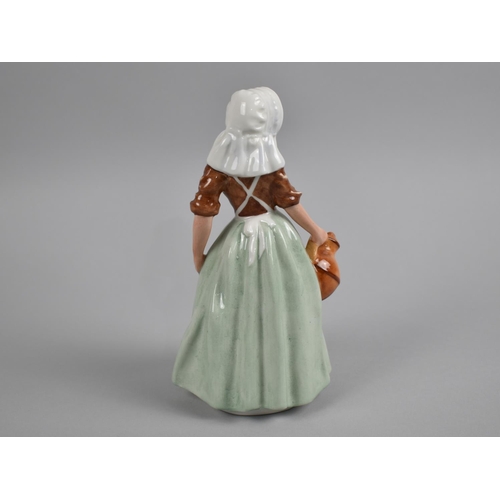 415 - A Royal Doulton Figure, The Milkmaid, HN2057