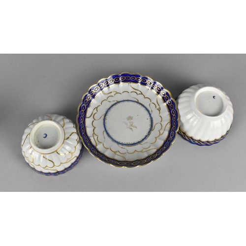 448 - An 18th/19th Century Worcester Tea Bowl and Saucer of Reeded Form Decorated with Cobalt Blue Inset T... 