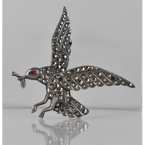 497 - A Vintage Silver and Marcasite Brooch in the Form of a Bird with Red Jewelled Eye