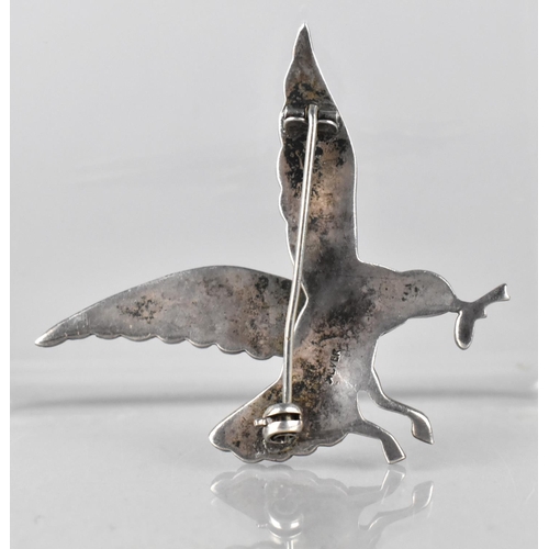 497 - A Vintage Silver and Marcasite Brooch in the Form of a Bird with Red Jewelled Eye