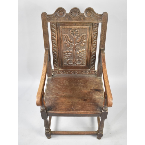 579 - A 19th Century Carved Back Gothic Style Oak Armchair