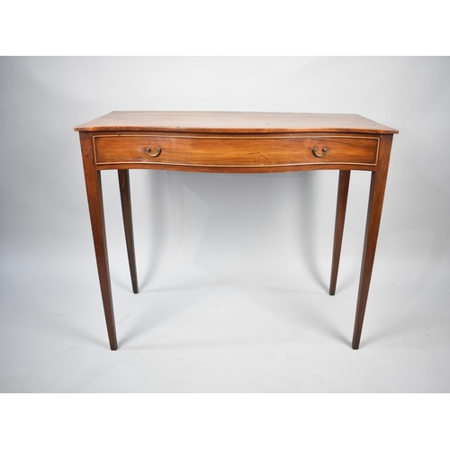 70 - An Edwardian Serpentine Front Side Table with Single Long Drawer on Tapering Square Supports, 91cms ... 