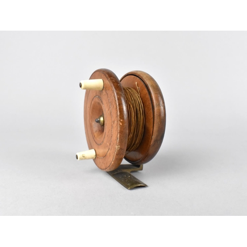 79 - A Vintage Brass Mounted Wooden Fly Fishing Reel, 7.75cms Diameter