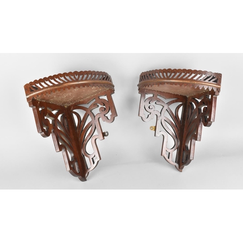 99 - A Pair of Edwardian Fret Cut Corner Wall Hanging Sconces with Pierced Galleries, 27cms High