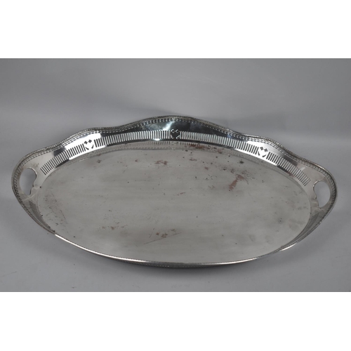 142 - A Georgian Style Silver Plated Oval Tray with Pierced Gallery and Two Handles, 58cms Long