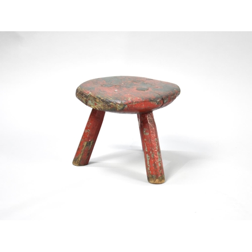 187 - A 19th Century Small Circular Rustic Milking Stool with Three Legs, 22cms Wide